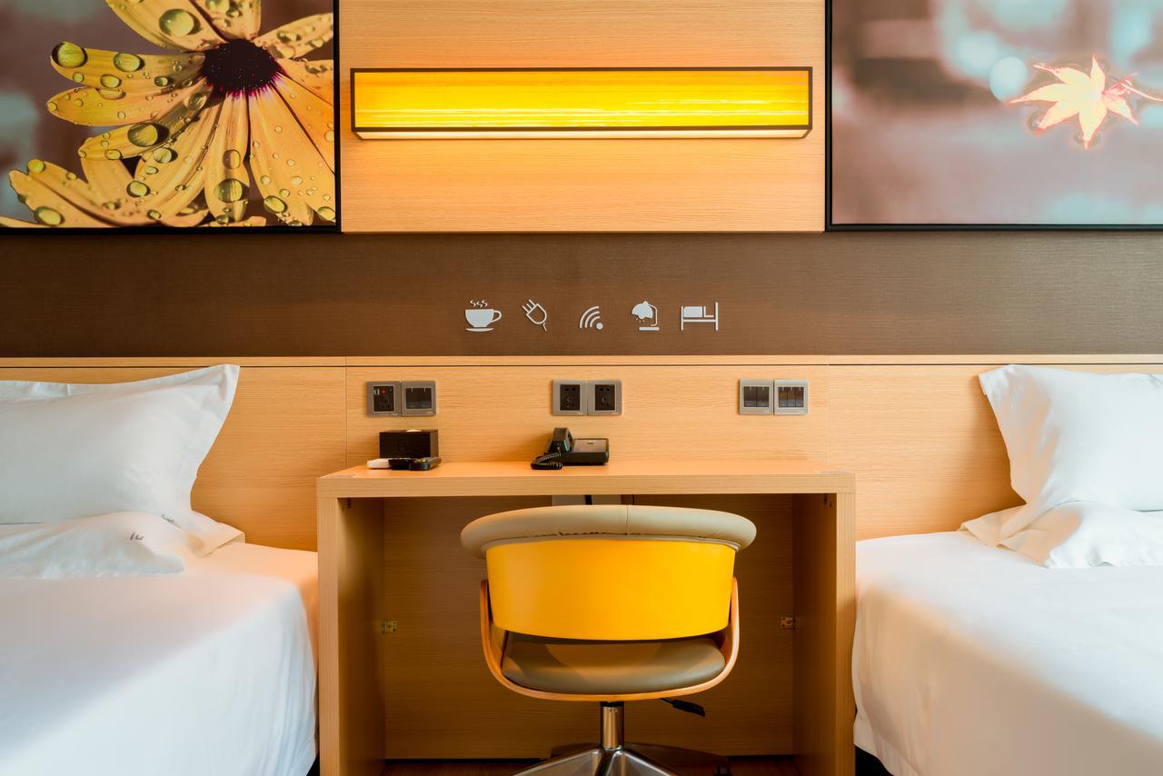 Iu Hotel Zhanjiang Haibin Avenue Xinhaimingchen エクステリア 写真